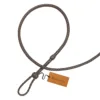 brown leather mini whip