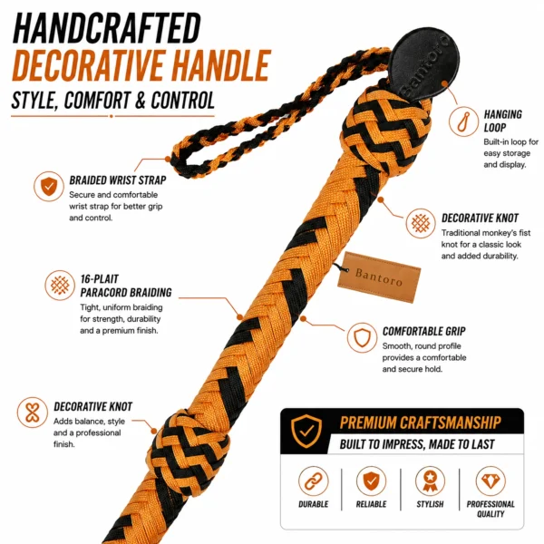 Close-up of the handcrafted black and orange paracord bullwhip handle featuring monkey fist knot, wrist strap, and hanging loop.