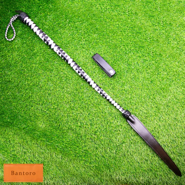 bdsm dragon tail whip black white angled full length view