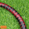bdsm dragon tail whip black red braided leather close up detail