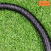 bdsm dragon tail whip black leather curved body close up