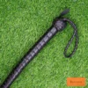 bdsm dragon tail whip black leather handle wrist loop close up