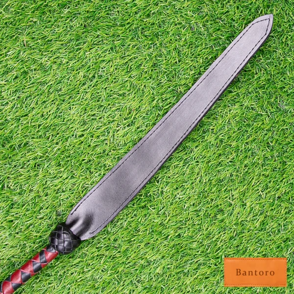 bdsm dragon tail whip black red leather slapper tip detail