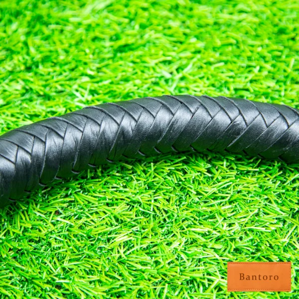 bdsm nagaika whip black braided body close up