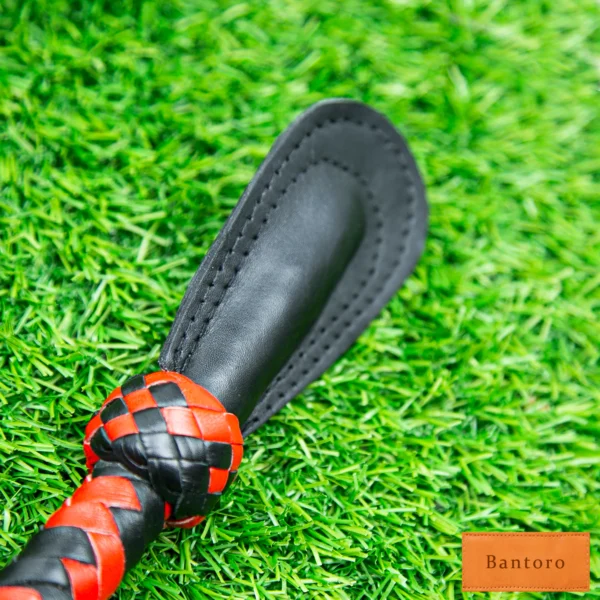 bdsm nagaika whip black leather tip close up