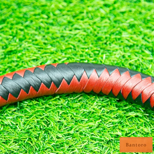 leather flogger premium red black braided leather body close up