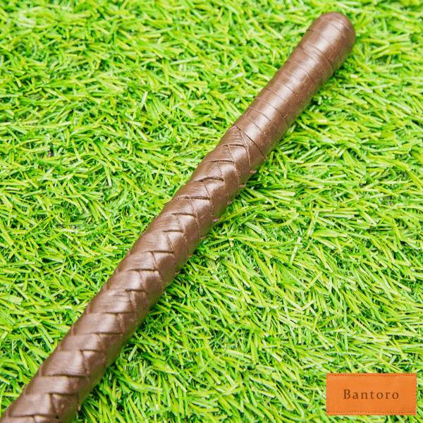 leather flogger brown shaft braided leather detail close up