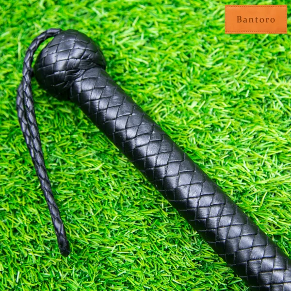 leather flogger premium black handle close up anti slip grip