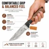 Damascus Hunting Knife held in hand showing ergonomic outdoor grip
