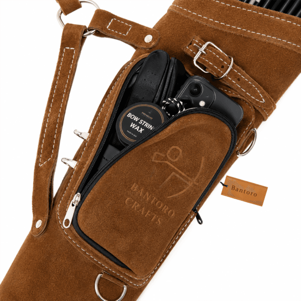 Leather Archery Quiver with a spacious zip storage pocket holding archery accessories, phone, wallet, and bow string wax.